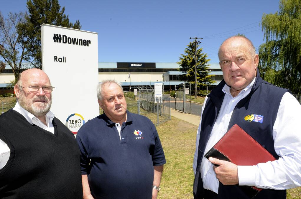 END OF THE LINE: Australian Workers' Union NSW Secretary Russ Collison, Australian Manufacturing Workers' Union industrial officer Ian Morrison, and Australia Workers' Union western region organiser Alan Haynes outside Bathurst's Downer EDI plant following meetings with workers and management yesterday. Photo: Chris Seabrook 101513cedi