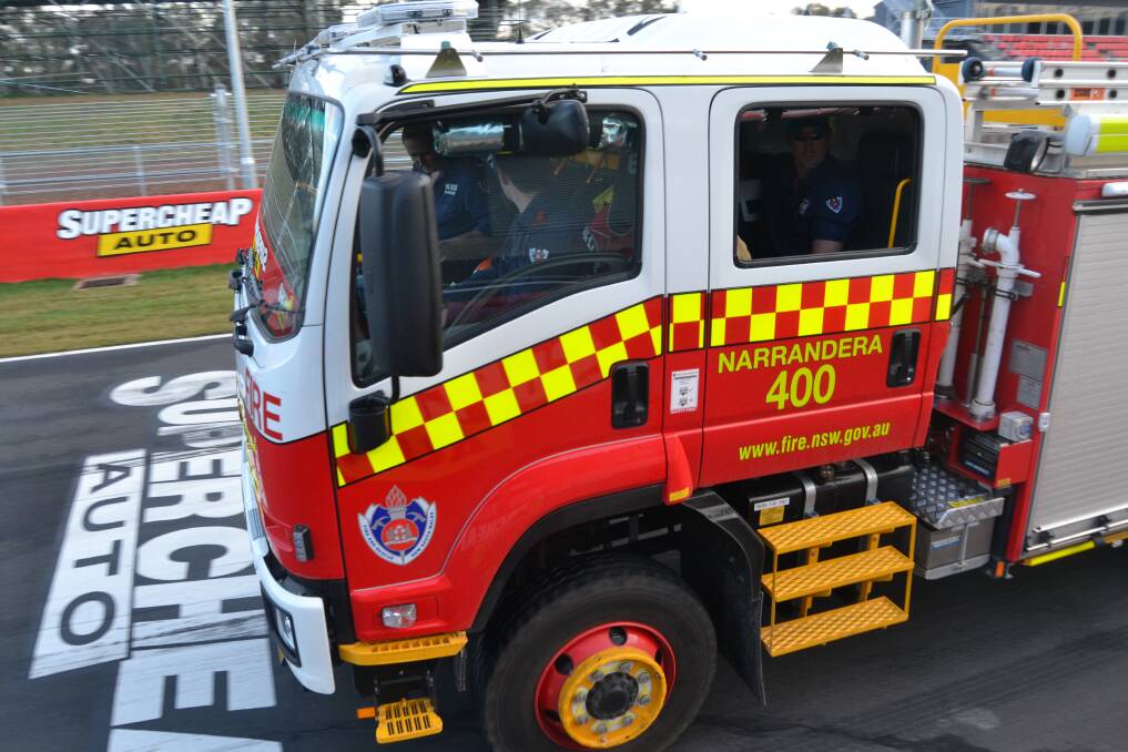 REGION WEST STRIKE TEAM: More than 90 firefighters and 21 trucks have pulled out of Mount Panorama, Bathurst, this morning on a mission to protect embattled communities in the Blue Mountains as the area braces for a day of hellish conditions.