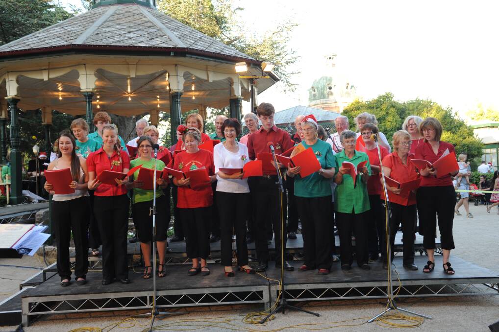 MERRY CHRISTMAS: Carols by Candlelight.  Photos by: CLARE LEWIS