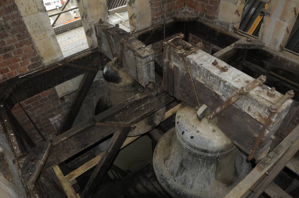 AUGUST: The two original bells were removed at the historic Cathedral of St Michael and St John ahead of a journey back to England for repairs. Photo: CHRIS SEABROOK 080713cbells
