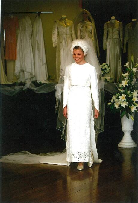 1968: Sleeveless, straight-fitting dress made of guipure lace. A white velvet jacket was worn over the top of the dress, with covered buttons down the front and falling into a long train at the back of the jacket. Robin married Mervyn Tobin on June 1, 1968  and dress was worn by Robyn's granddaughter, Sarah.