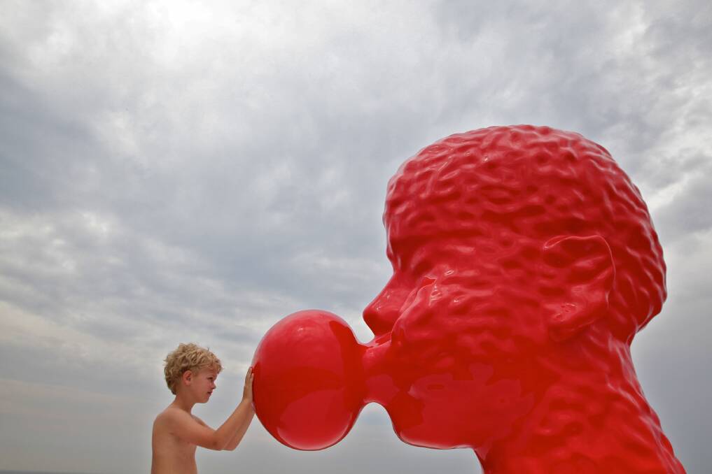 SCULPTURE BY THE SEA: Otto French from Melbourne with no. 5 Bubble by Qian Sihua. Photo: Danielle Smith