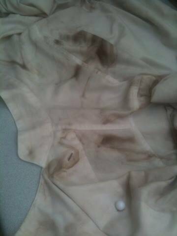 DIRTY WATER: Two work shirts and two brand new shirts ruined by dirty water yesterday. Photo submitted on Facebook.