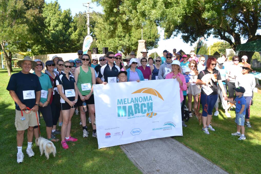 MARCH: Supporters of the Melanoma March about to head off from Bicentennial Park. Photo: CHRIS SEABROOK. 032413cmel7