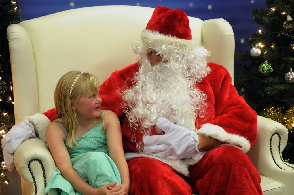 2012: Maddison Mabeth and Santa. 