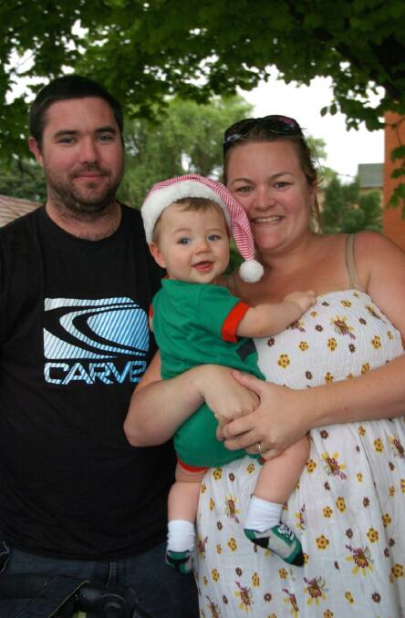 2011: Brian and Tara Ruxton and their eight-month-old son Bentley. 121111zcarols12
