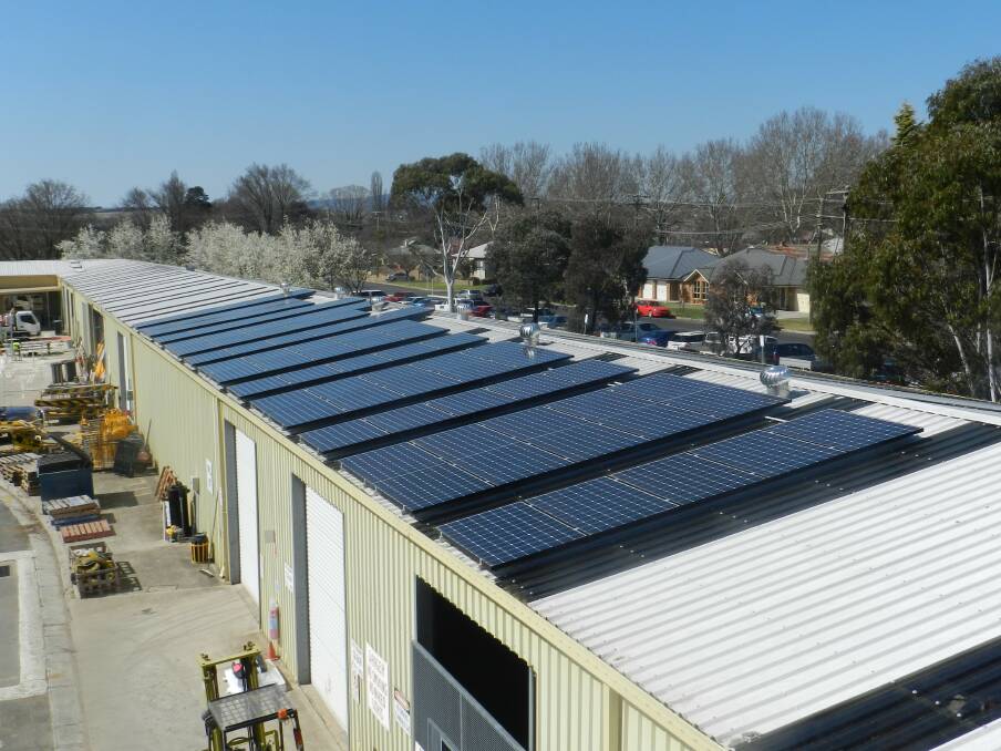 GOING GREEN: New solar panels at Bathurst Regional Council's Peel Street depot are just one of a raft of power-saving initiatives being introduced by the local government organisation. 	090413green