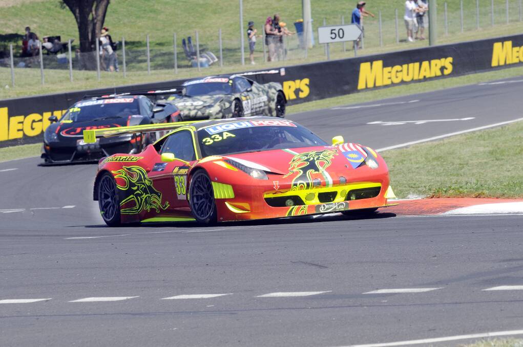 FAST: Craig Baird in the Clearwater Racing Ferrari was third-quickest in opening practice yesterday for the Bathurst 12 Hour behind Allan Simonsen. Photo: PHILL MURRAY 	020813phour9