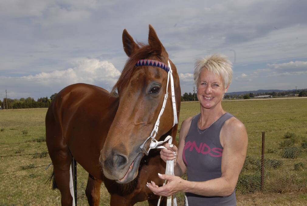 SHE’S BACK: Gayna Williams was Bathurst’s premier trainer before she left in 2011, but she has relocated again. She and her husband Frank have moved from Grafton to Gulgong and will make the trip to Tyers Park today. Photo: PHILL MURRAY 	102209pgayna