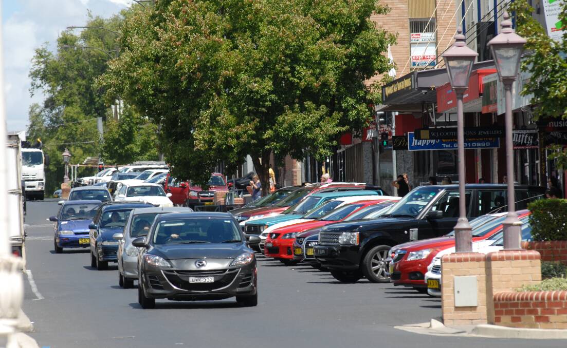 FULL HOUSE: A report has found there are hundreds of empty car spaces in the CBD – but you’ll still struggle to find a spot on William Street. Photo: ZENIO LAPKA 	021813zparking