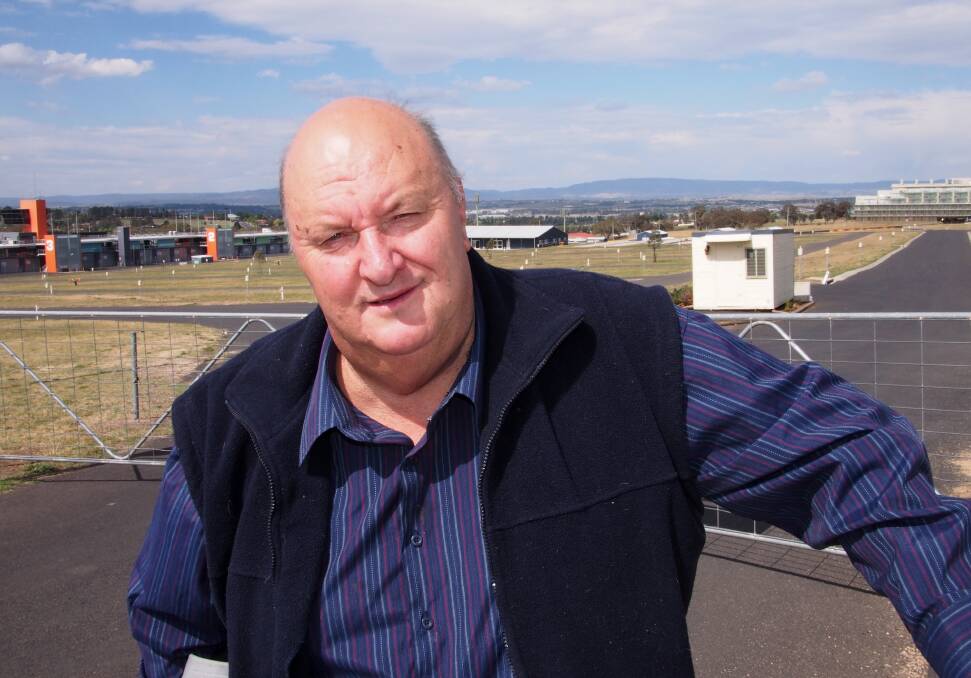 ROADS SCHOLAR: Local motorsport guru Brian Nightingale, pictured at Mount Panorama, is urging locals to have their say on who should be honoured by having a road at the famous circuit named after them. Photo: ZENIO LAPKA	 102813znighto