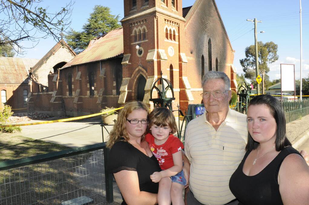 DEVASTATING LOSS: Four generations of Bathurst’s Campbell family are mourning the loss of St Barnabas’ Anglican Church. Max Campbell is pictured with his granddaughters Amy Dalton (left) and Hollie Coleman and great granddaughter Jayda Dalton outside the church that had hosted their family’s weddings, christenings and funerals for many years. Photo: CHRIS SEABROOK	 022414church3