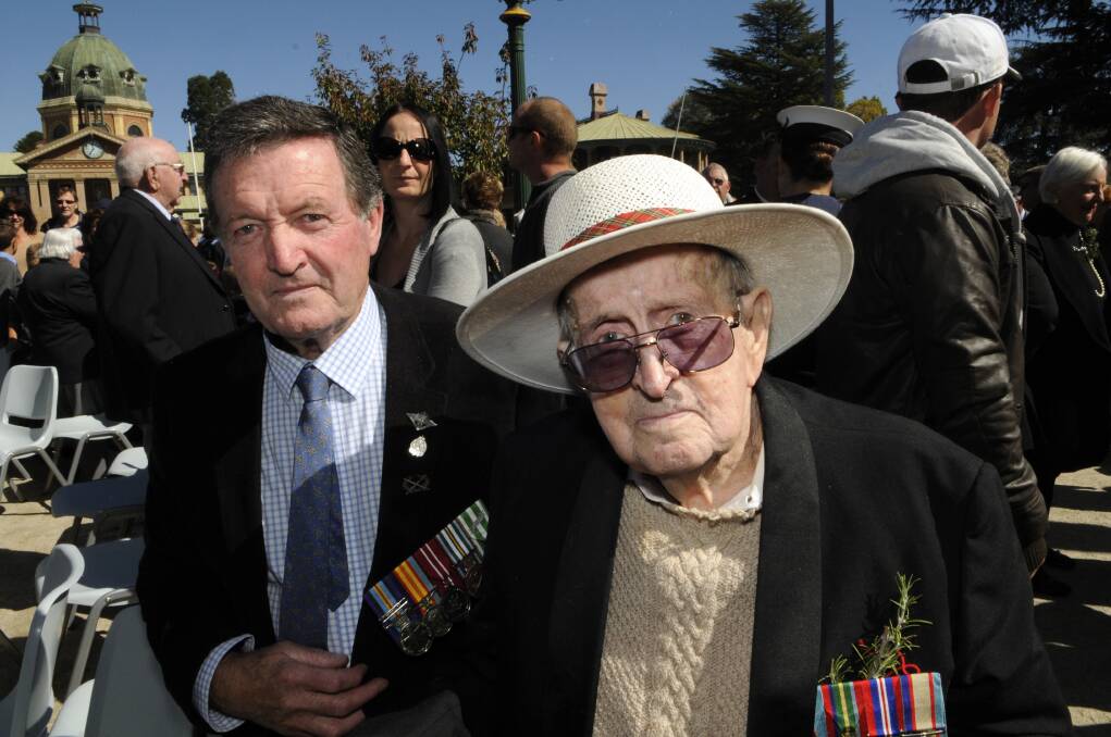 TWO BROTHERS, TWO WARS: Brothers Brendan and Ronald McGill at yesterday’s Citizens’ Commemoration Service. Photo: PHILL MURRAY     042513panzac45