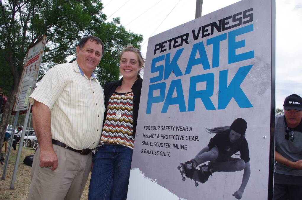 SKATE PARK: Former Western Advocate journalist Peter Veness has had a Gilgandra skate park named in his honour. Pictured at the official unveiling of the facility on Saturday are shire mayor Doug Batten and Bec Veness. Photo: BRIAN WOOD 110312skate5