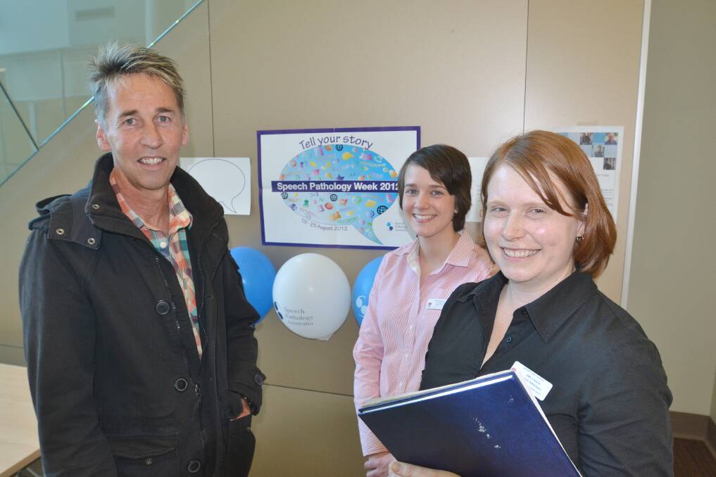 MAKING A DIFFERENCE: Client Peter Wilson with speech pathologists Lauren Fisher and Emily Davis at Bathurst Base Hospital.  Photo: CHRIS SEABROOK 082112cspeech