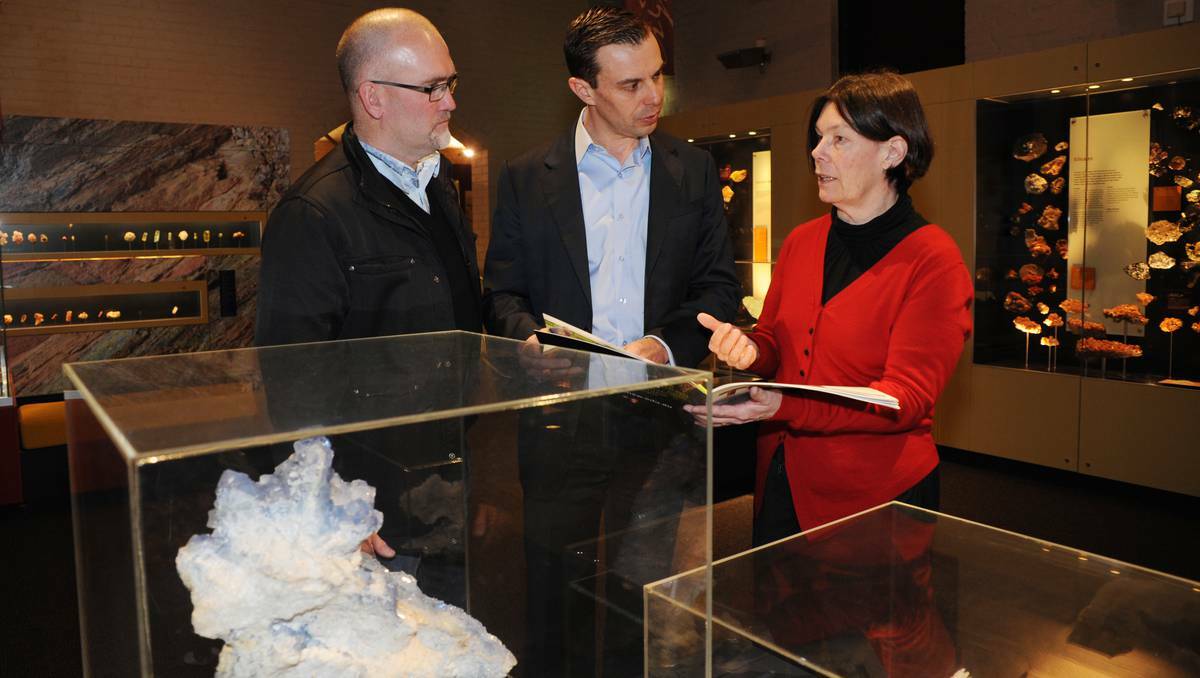 BATHURST: Deputy mayor Ian North, NSW Minerals Council CEO Stephen Galilee and associate professor Marilyn Pietsch of CSU at the Australian Fossil and Mineral Museum on Monday. Photo: ZENIO LAPKA 071513zmineral1