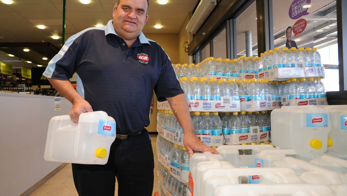 BATHURST: Bernardi’s Marketplace Supa IGA manager Geoff Bottom got in pallets of water following a failure at the city’s water filtration plant. Photo: ZENIO LAPKA 063013ziga