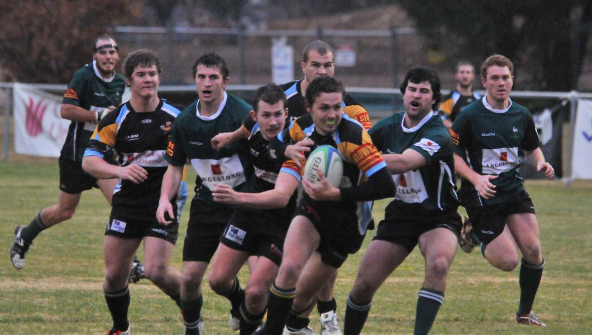 BATHURST: Nick Rutherford finds a gap in the Orange Emus defence and heads for the line as CSU won 29-19 on Saturday. Photo: ZENIO LAPKA 060113zcsu4