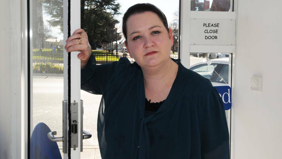 BATHURST: Solicitor Emma Mason wants Bathurst Regional Council to reassess its policy on CCTV in the city after a man tried to rob her as she left work late on Wednesday night. Photo: ZENIO LAPKA 	080113zmason1