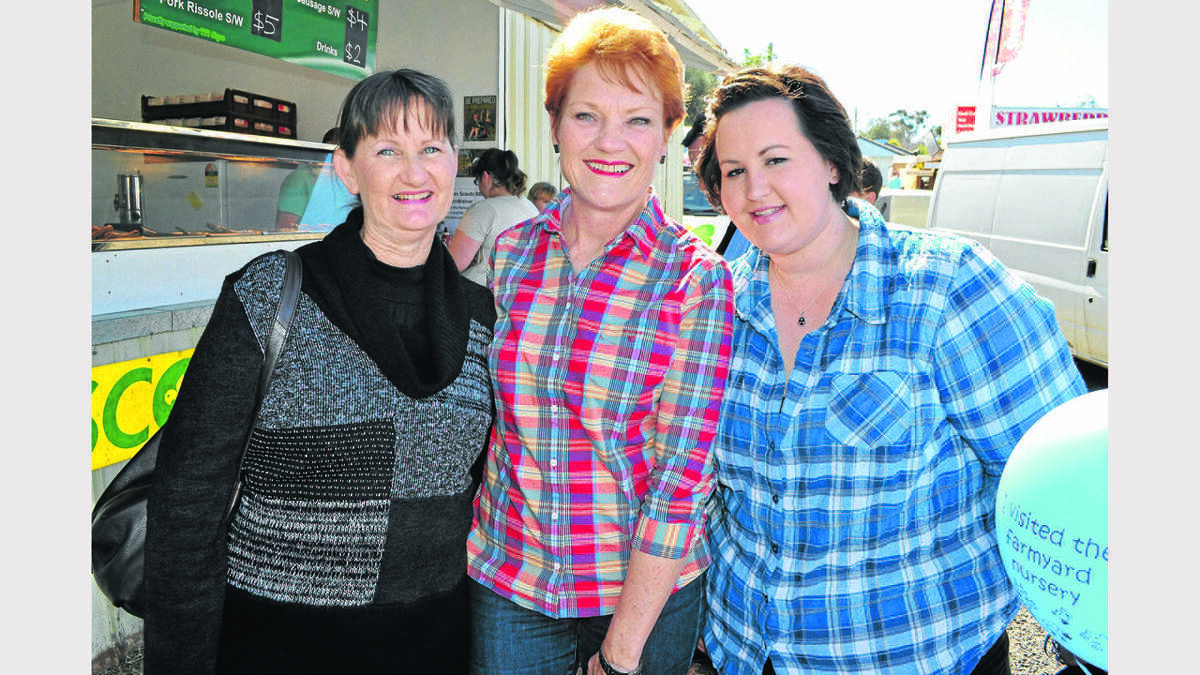 PARKES: One Nation Icon and candidate for the upcoming election Pauline Hanson visited the Parkes Show where she chatted to patrons Lea (left) and Carla Oram.