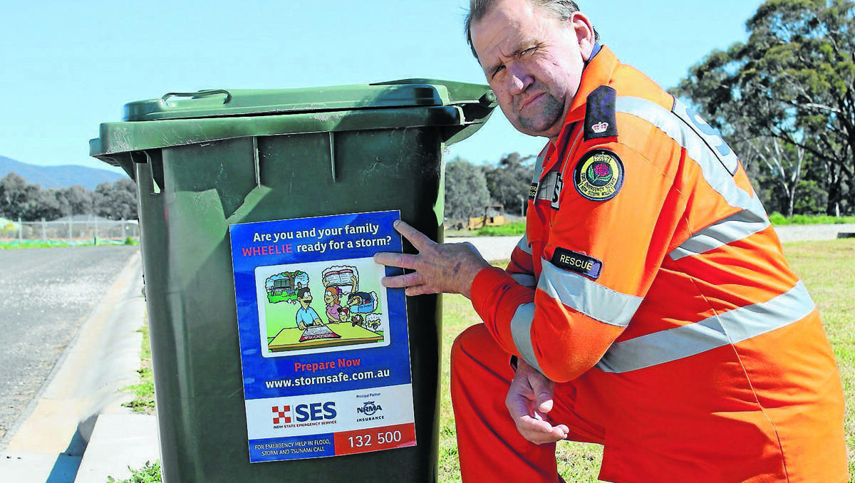 MUDGEE: Mudgee SES Unit Controller Ian Forrester pictured with one of the wheelie bin stickers local volunteers will be handing out this Saturday morning during their door knock of the town’s most flood prone areas.