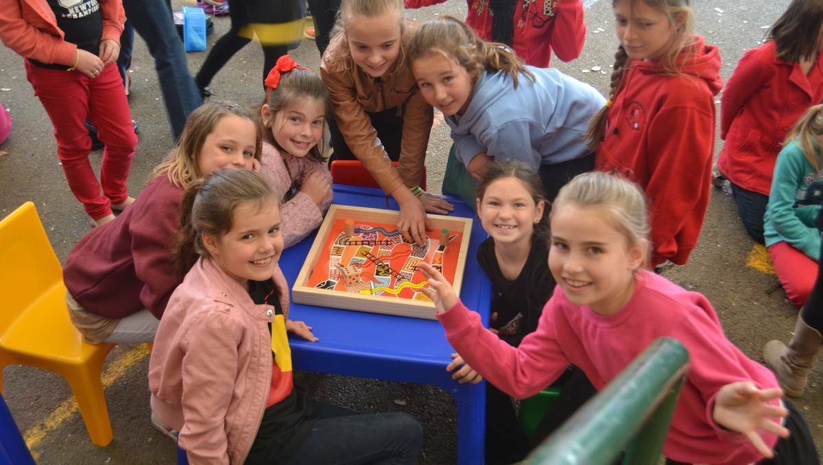 WELLINGTON: St Mary's students play a snakes and ladders game from Wachs.