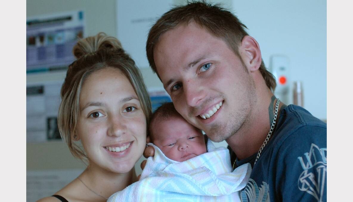 Mitch Edwards and Ebony Thomas with their daughter Sophia Grace, who was born on February 28. Photo: ZENIO LAPKA