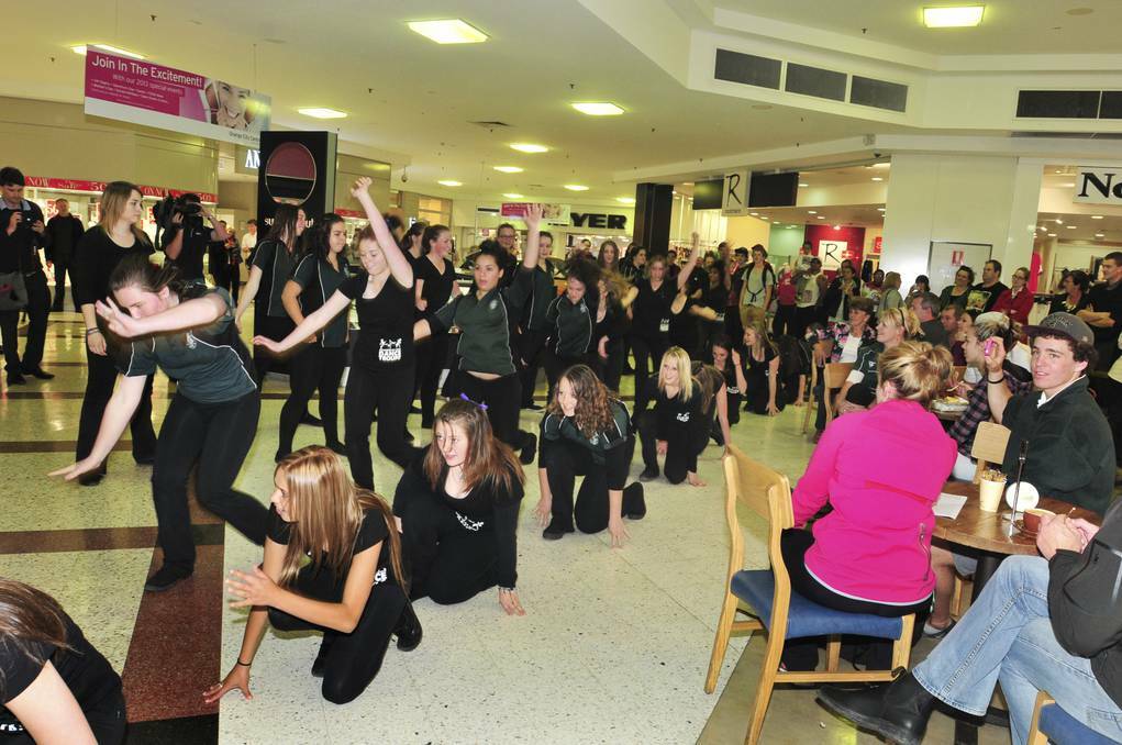 ORANGE: Students from Canobolas Rural Technology High School during a flash mob at Orange City Centre. Photo: Jude Keogh