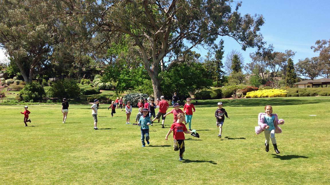 COWRA: Kids in PCYC School Holiday Care stretch their legs at the Japanese Gardens.