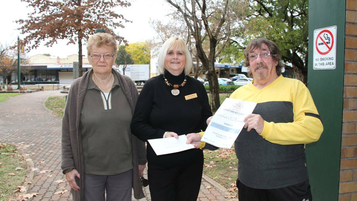 WELLINGTON: The latest donation from the Wellington Country Music Association as they wind up has been $2200 to Cancer Care Western NSW for Western Care Lodge. Pictured here are Volunteer Rae Batho, Jan Savage and Jayson O'Brien.