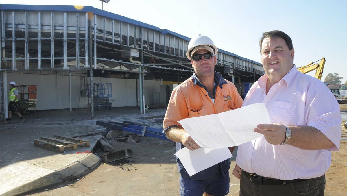 DUBBO: Terry Hones of the MAAS Group and general manager of The BachRach Naumberger Group Steve Gooley confer on the expansion of retail spaces on the southern side of the Orana Mall. PHOTOS: BELINDA SOOLE