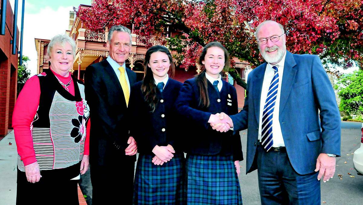 ORANGE: Warrumbungle shire mayor Peter Shinton came to Kinross Wolaroi School on Tuesday to thank students for their fundraising efforts for bushfire victims. Pictured here are Julie Shinton, Kinross Wolaroi School principal Brian Kennelly, students Talor and Brooke Hamilton and Warrumbungle shire mayor Peter Shinton. Photo: JUDE KEOGH
