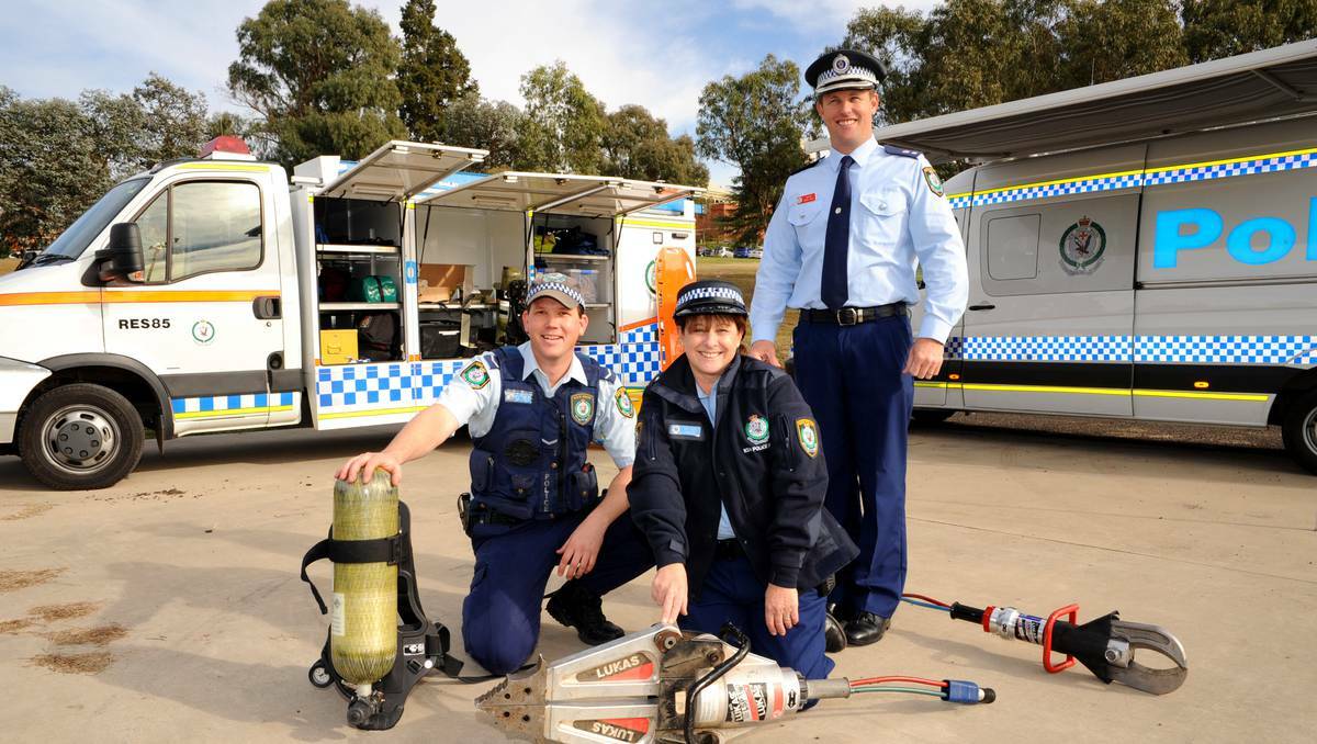 BATHURST:  Youth liaison officer Constable Matt Holden, crime prevention officer Senior Constable Sue Rose and Acting Superintendent Mark Wall get ready for the police community day this week. 062713zpolice