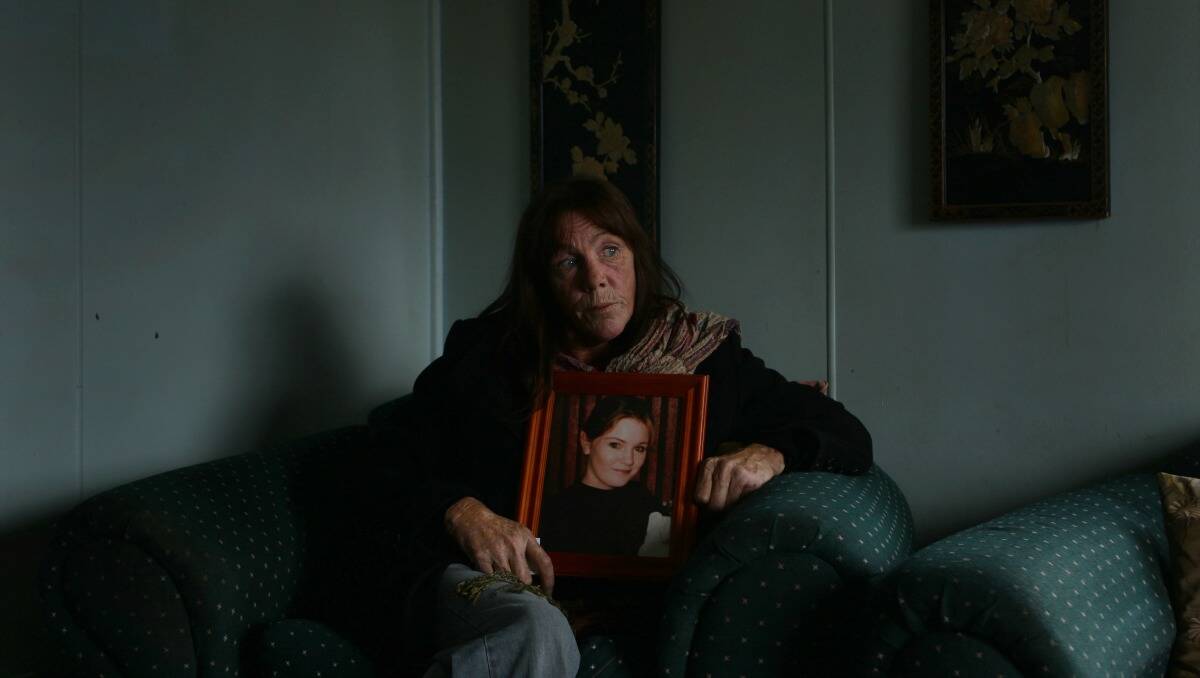 Bathurst mother Ricki Small holds a photo of her missing daughter Jessica.