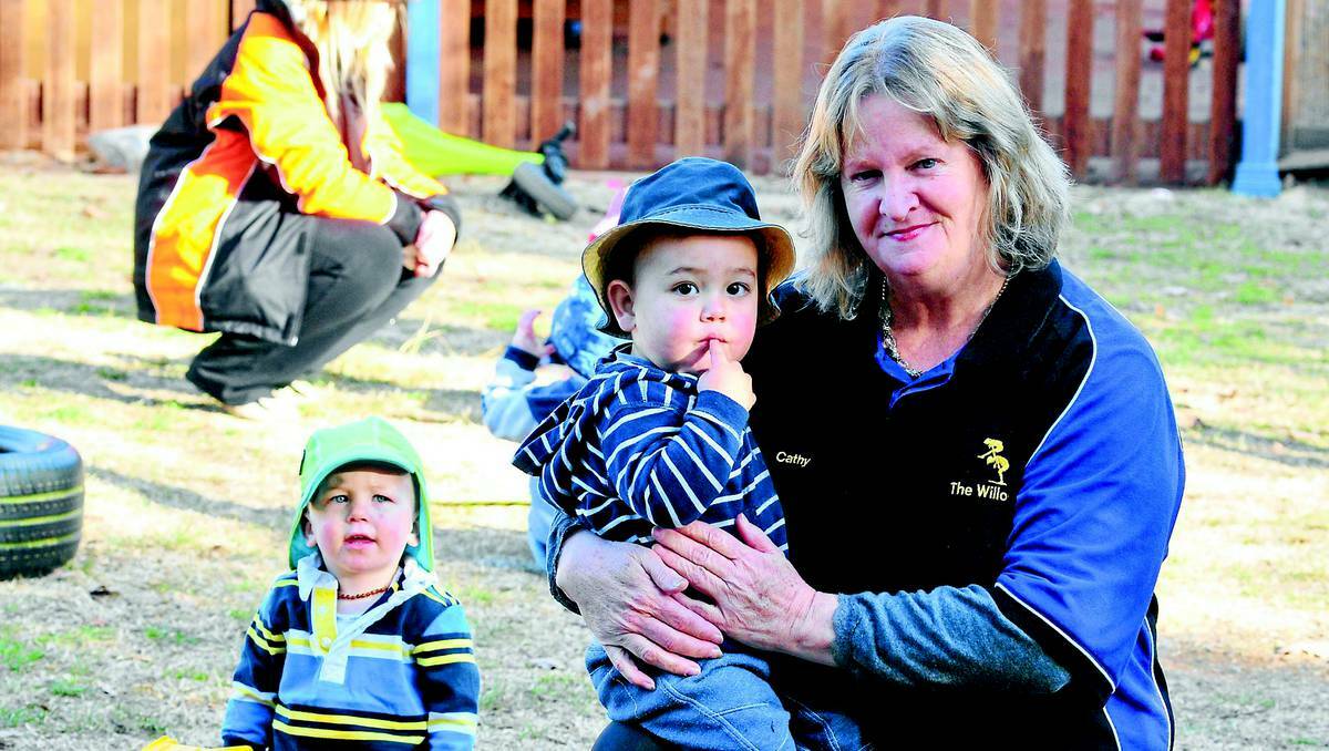 ORANGE:Vacinations a parents choice. Willows Preschool and Early Learning Centre owner Cathy Carroll and Myles Layzell enjoy free play outside. Photo: JUDE KEOGH 0520immunise1