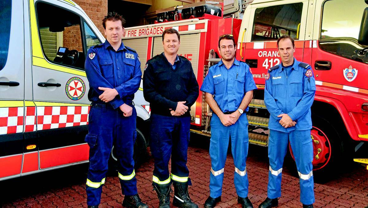 ORANGE:  Fire and Rescue NSW firefighters Brendan Swain and Grant Crossman with NSW Ambulance Service paramedics Luke Anderson and Ian Spurway say they are happy to share the top spot as Australia's most trusted profession. Photo: LUKE SCHUYLER 0618lstrust