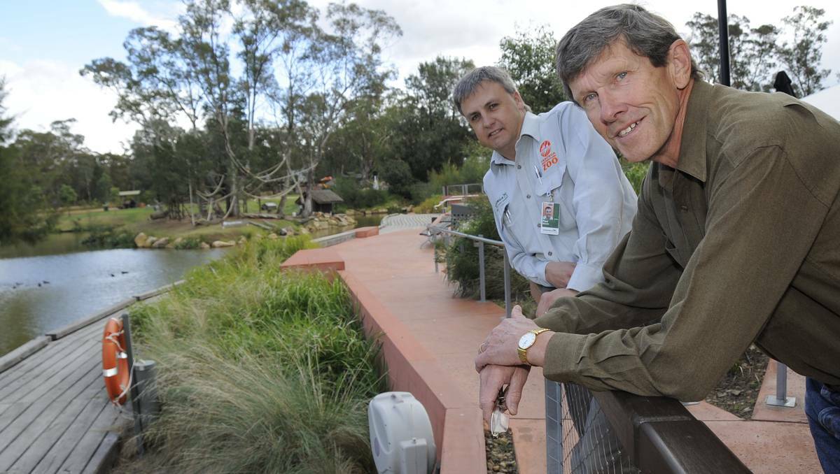 DUBBO: Taronga Western Plains Zoo manager of life sciences Paul Metcalfe and chair of volunteering committee Bob Barden, who has been volunteering for 26 years. Photo: BELINDA SOOLE
