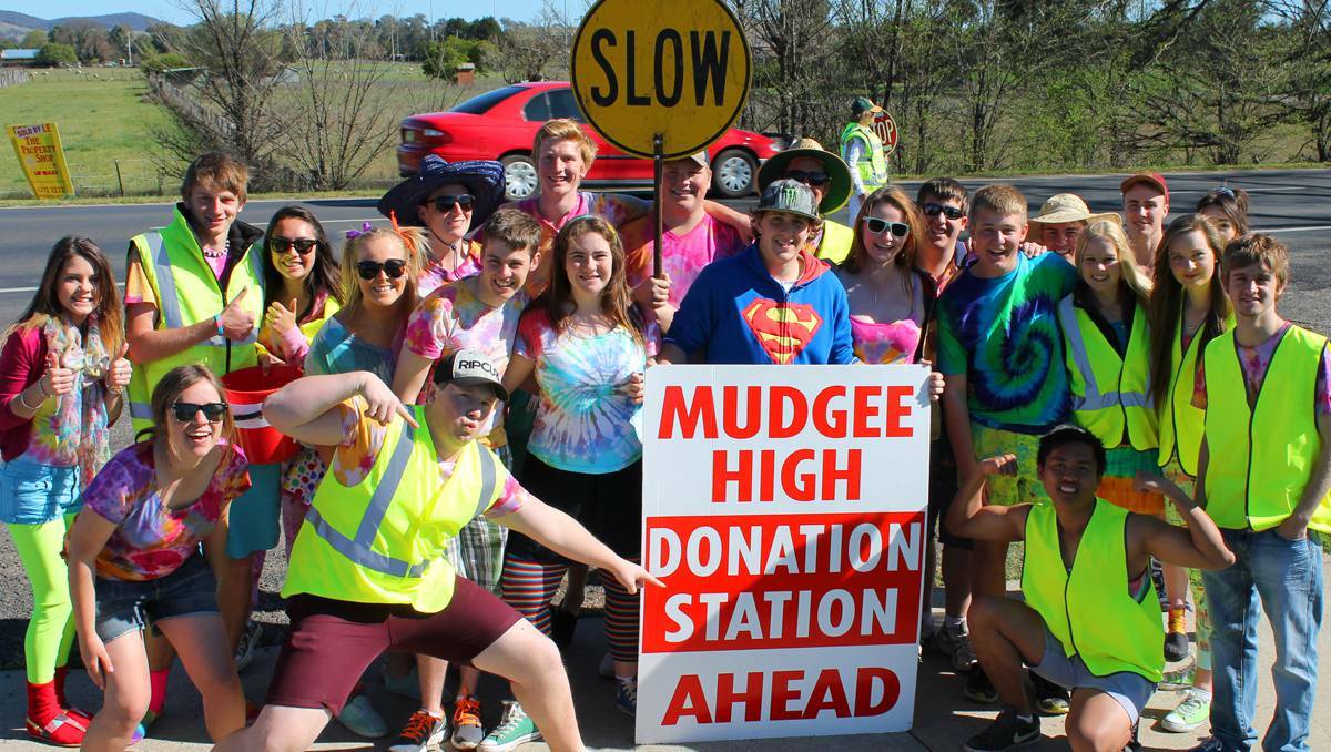 MUDGEE: Year 12 students from Mudgee High School at the Ulan Road road block for the annual Rainbow Day fundraiser on Thursday.