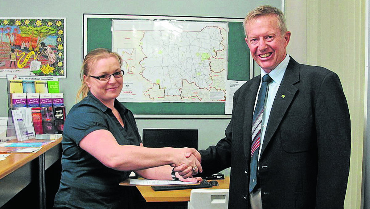 Mark Coulton is formally declared as the Federal Member for Parkes by Divisional Returning Officer Erin Eames on Tuesday.
