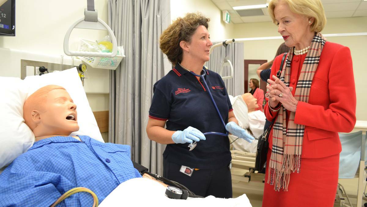 VIRTUAL REALITY: Governor-General Quentin Bryce chats with second year nursing student Lisa Mallard yesterday. Photo: BRIAN WOOD 051413ggnurse