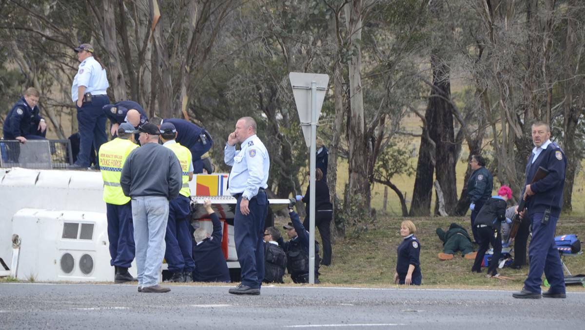 LITHGOW: FIVE inmates were taken to hospital on Monday after a Corrective Services vehicle overturned at the intersection of the Great Western Highway and the Lithgow Correctional Centre.Photo: TROY WALSH.