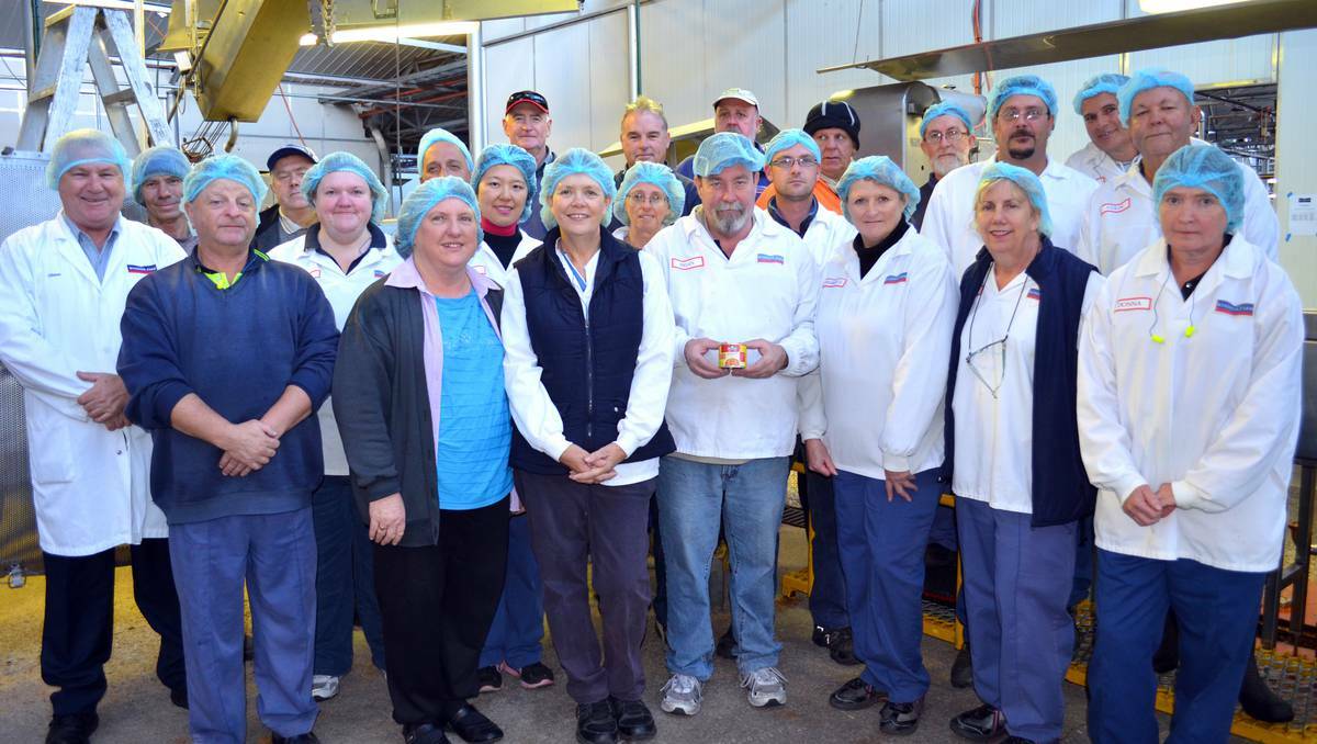 COWRA: The last product to come off a production line at the Windsor Farm Foods Cowra cannery was this gluten free spaghetti for the Orgran label, held here by Brian Williams (centre). The owners of this label will have the product produced in the UK from now on.