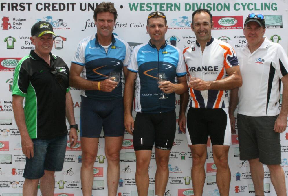 THE VICTORS: From left, John Paine (general manager of Family First Credit Union) congratulates Steve Bennett (Bathurst), Brad Roughley (Bathurst) and Charlie Gascoyne (Orange) for their efforts in the Western Division Criterium Championship’s elite division race. They are pictured with Phil Egan, the vice president of the Bathurst Cycling Club.