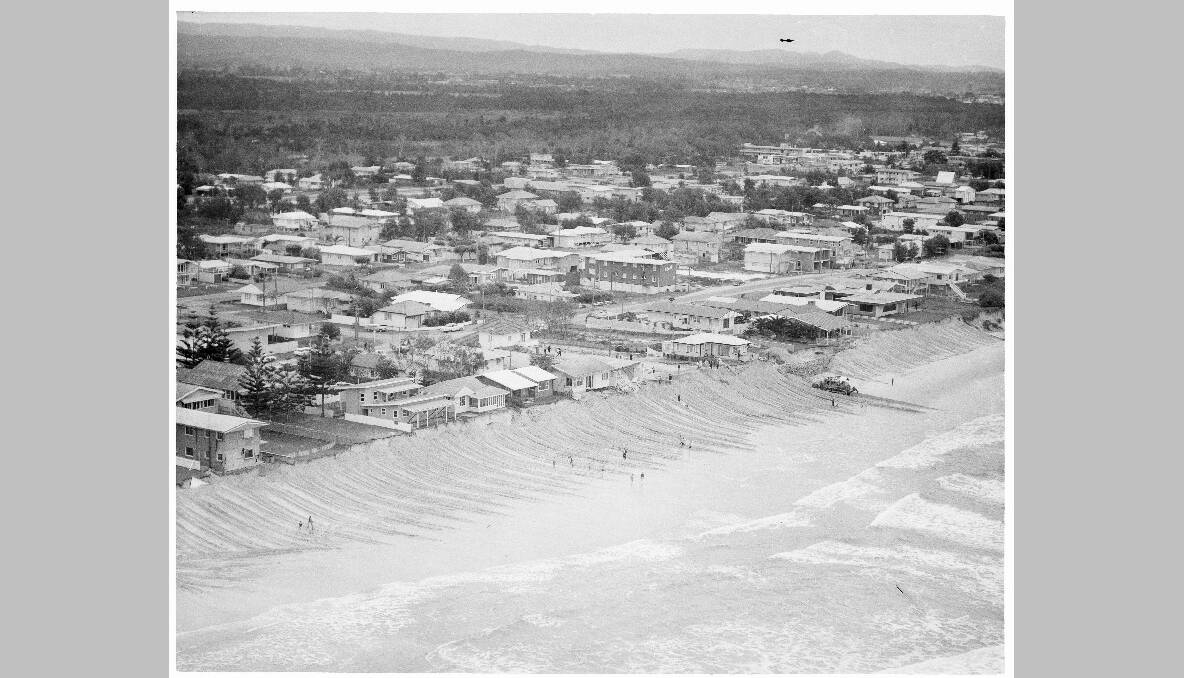 Waterfront of Surfers Paradise is rebuilt after erosion from rough seas. Photo: National Archives of Australia