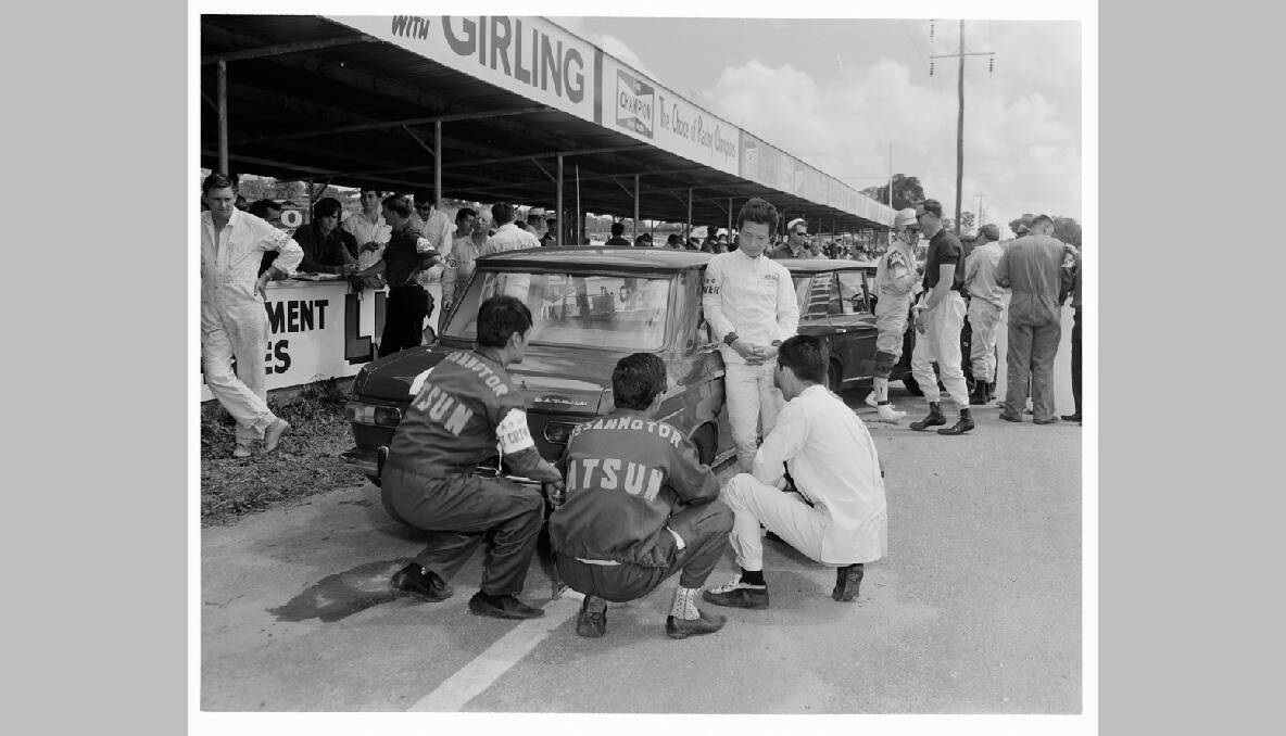 Japanese pit crew before their victory in the "A" class section of the Gallaher 500, 1966. Photo: The National Archives of Australia