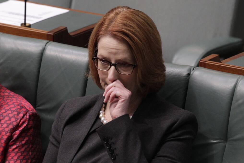 An emotional Prime Minister Julia Gillard introduced legislation to partially fund DisabilityCare in Parliament House Canberra. Photo: Andrew Meares