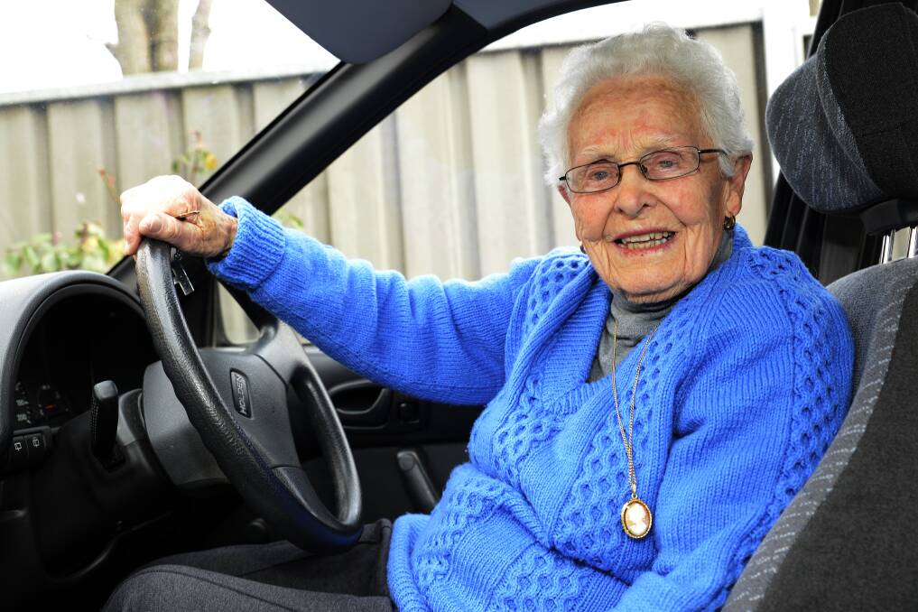 READY TO ROLL: 96-year-old Francie Morris is still behind the wheel of her beloved silver Barina, though a restricted licence means she can go no more than 15 kilometres out of town. Photo: PHILL MURRAY 080813pfrancie