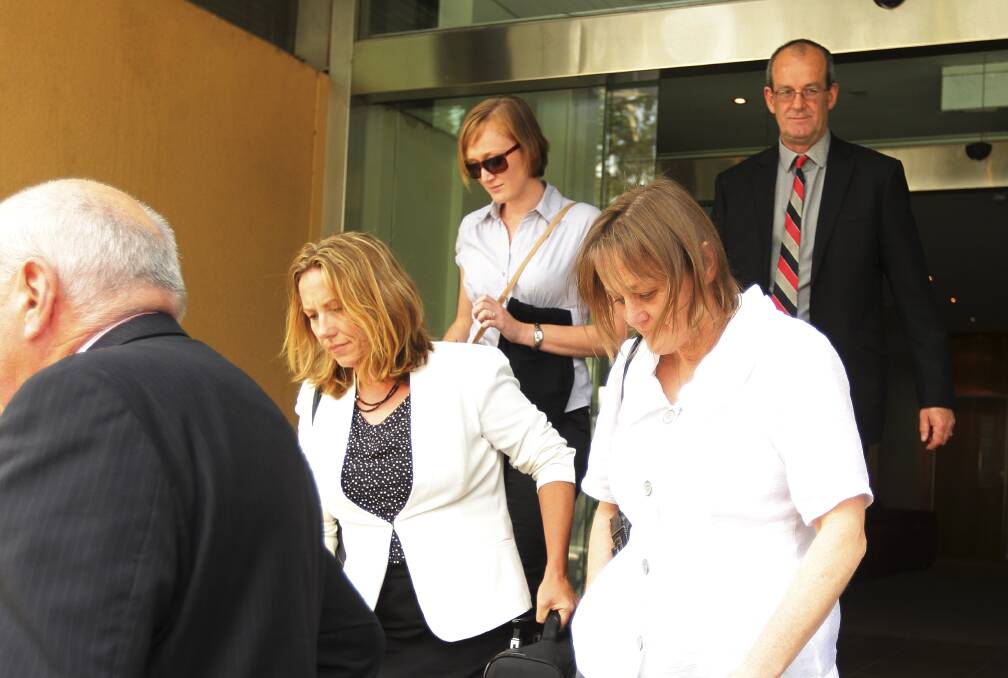 LOOKING FOR ANSWERS: Alec Meikle’s family – including sister Rebecca, mother Andrea and father Richard – leave the NSW State Coroner’s Court yesterday following an adjournment in the inquest into his death. 120213jaelc