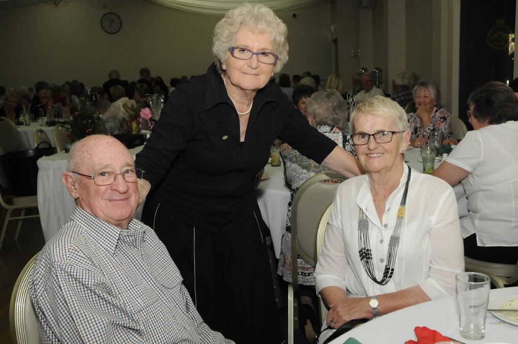 CAN ASSIST LUNCHEON: Bev Dickson with John and Patricia Hyland.