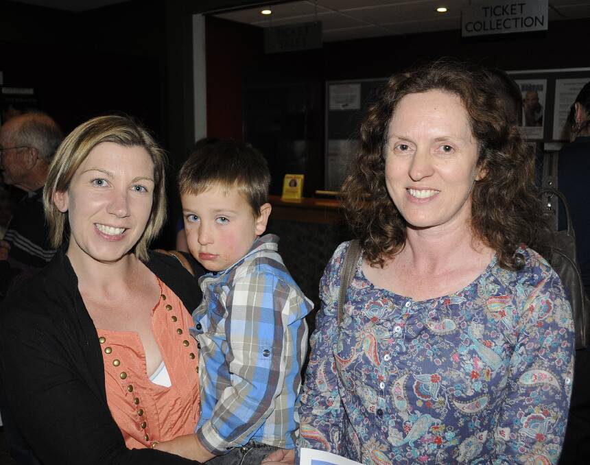 GRAND CONCERT: Danni Johnson, holding her son Logan, with Kimberley Campbell. 